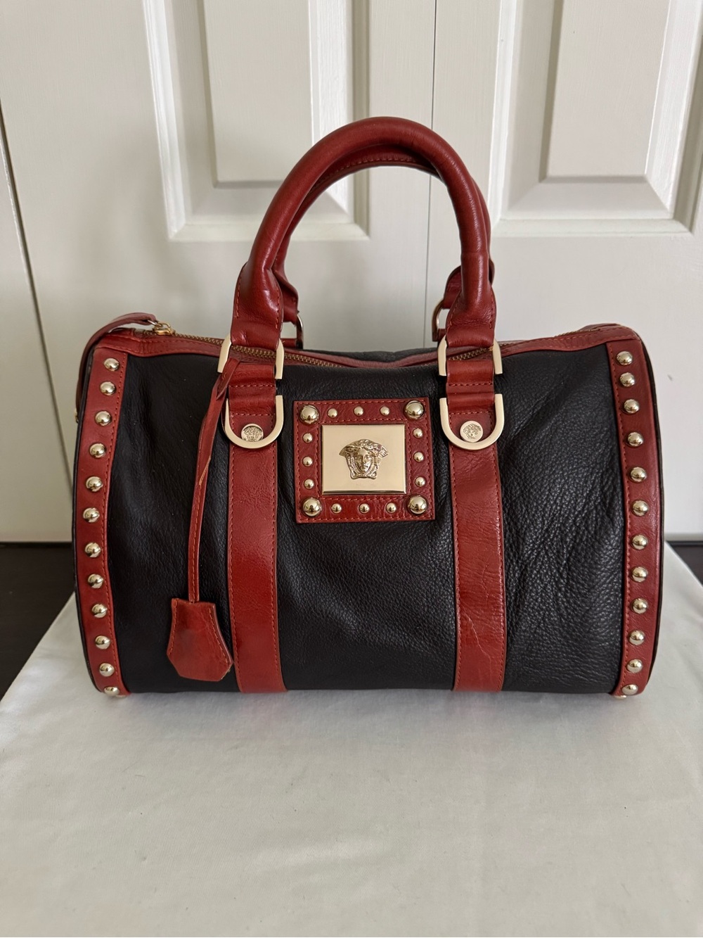 Luxury Black and Brown Leather Studded Satchel with Medusa Plaque